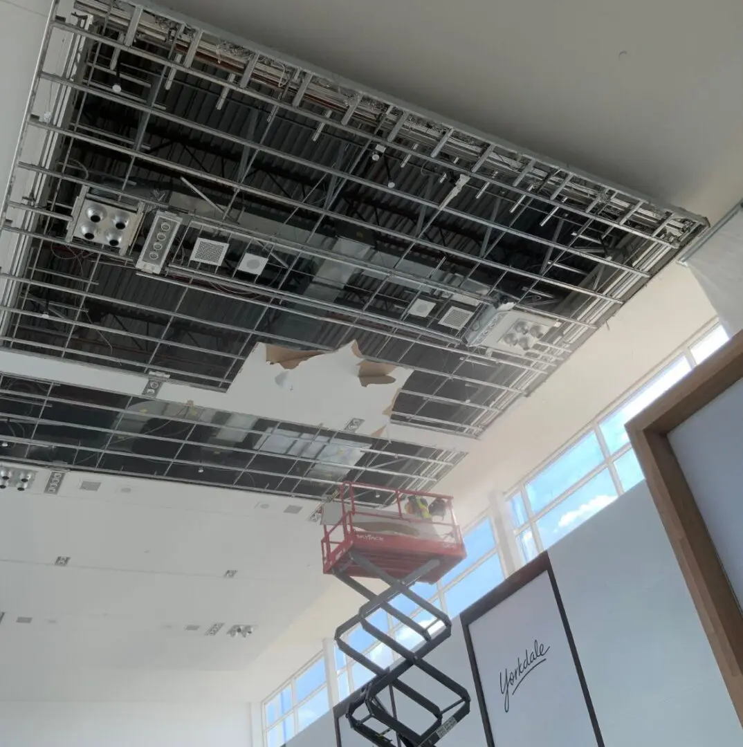 Construction work finishing the ceiling in the great hall