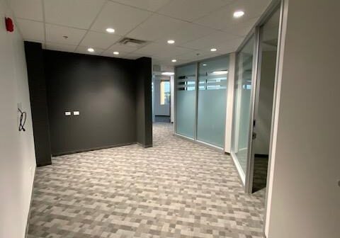 brightly lit office hallway